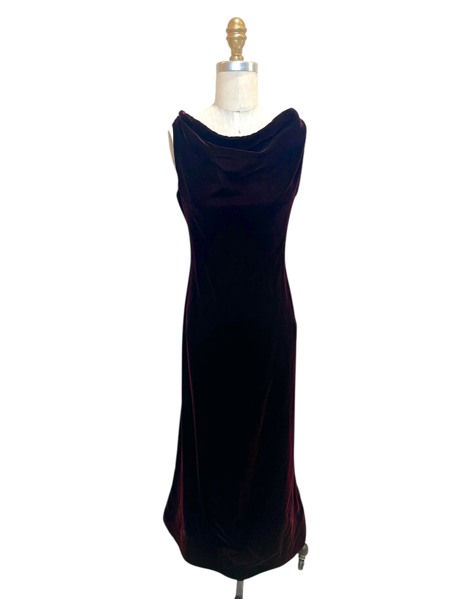 Front view of an archival Alaïa Fall Winter 2008 burgundy velvet evening gown featuring a draped cowl neckline and sculpted silhouette, made in Italy.