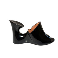 Black Alaia wedge mule right shoe outside side view on a white background