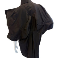 Alexander McQueen Black shirt dress detailing structured shoulders on a mannequin against a white background