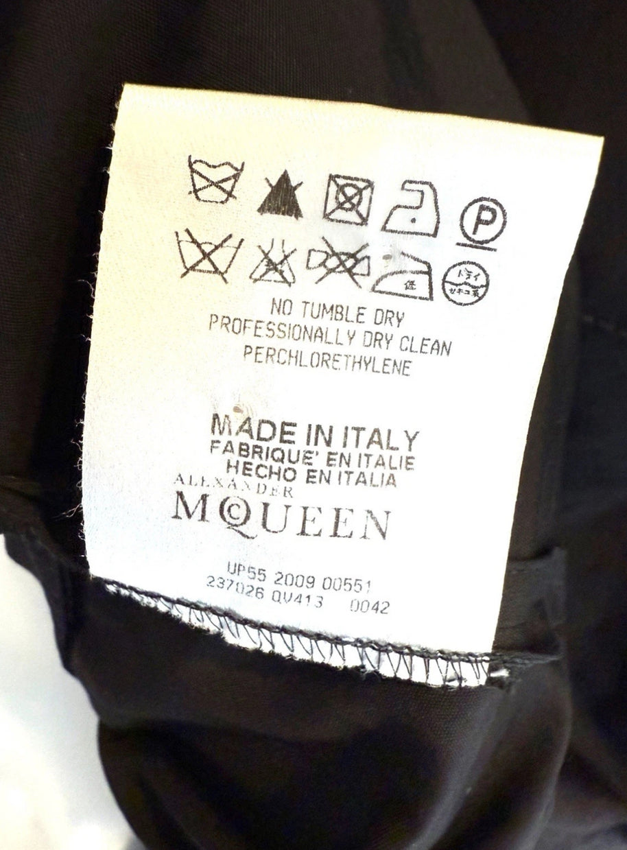 Alexander McQueen Black Shirt Dress Clothing label with care instructions and brand name on a garment.