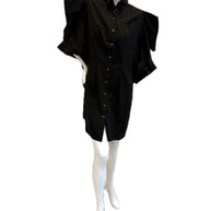 Alexander McQueen Black sculptured shirt dress on a mannequin against a white background