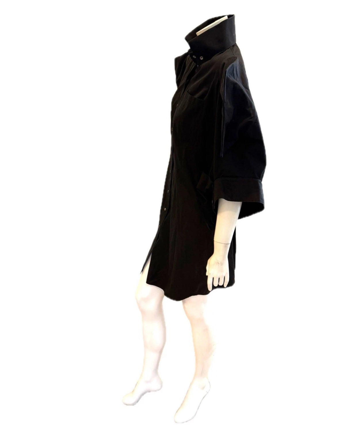 Alexander McQueen Black shirt dress on a mannequin against a white background detailing left side view