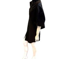 Alexander McQueen Black shirt dress on a mannequin against a white background detailing left side view