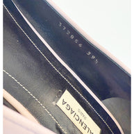 Zoomed interior shot of Balenciaga ballet flat showing the logo label, black leather insole, and size stamp “372856 39.5.”