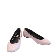 Powder pink Balenciaga lambskin ballet flats shown side-by-side with silver studded heels and rounded toes on a white background.
