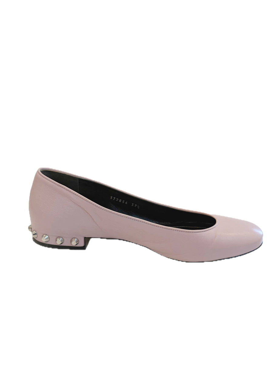 Inner profile view of the Balenciaga powder pink lambskin flats showing soft leather texture and studded heel.