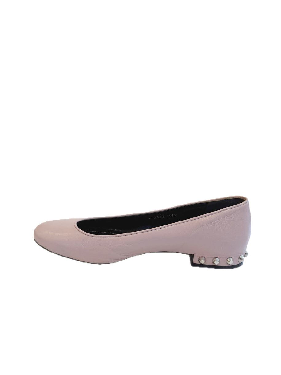 Right-side profile of Balenciaga pink leather flats with sculpted studded heel and smooth lambskin finish.