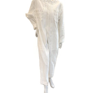 Front view of Bernhard Willhelm SS20 “Lost Weekend” oversized white jacquard jumpsuit with dual zippers and lattice appliqué.