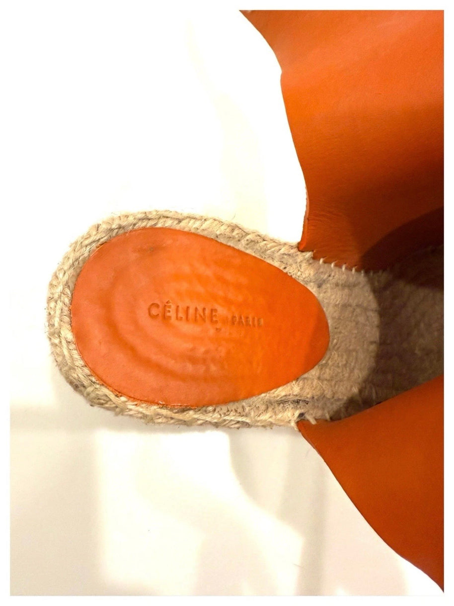 Macro close-up of the Céline Paris stamped leather insole and jute platform edge.