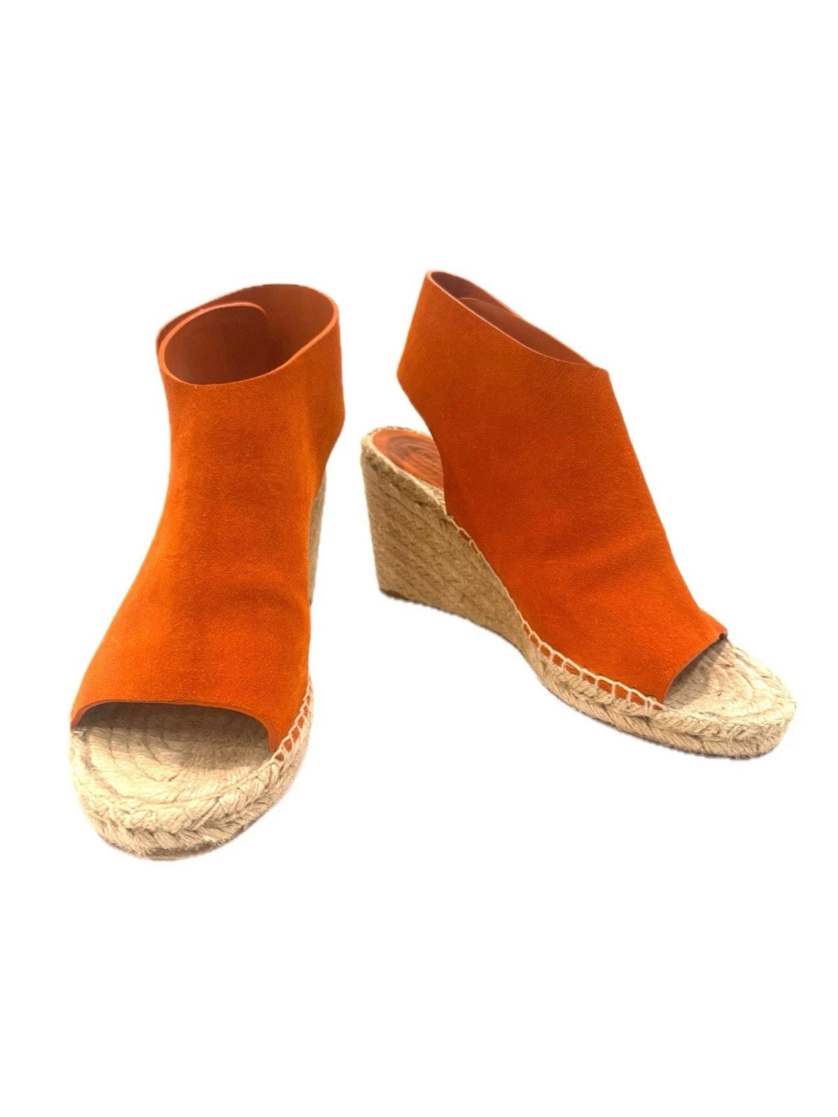 Burnt orange Céline suede espadrille wedges shown at a front angle, highlighting the open-toe silhouette and natural jute wedge.