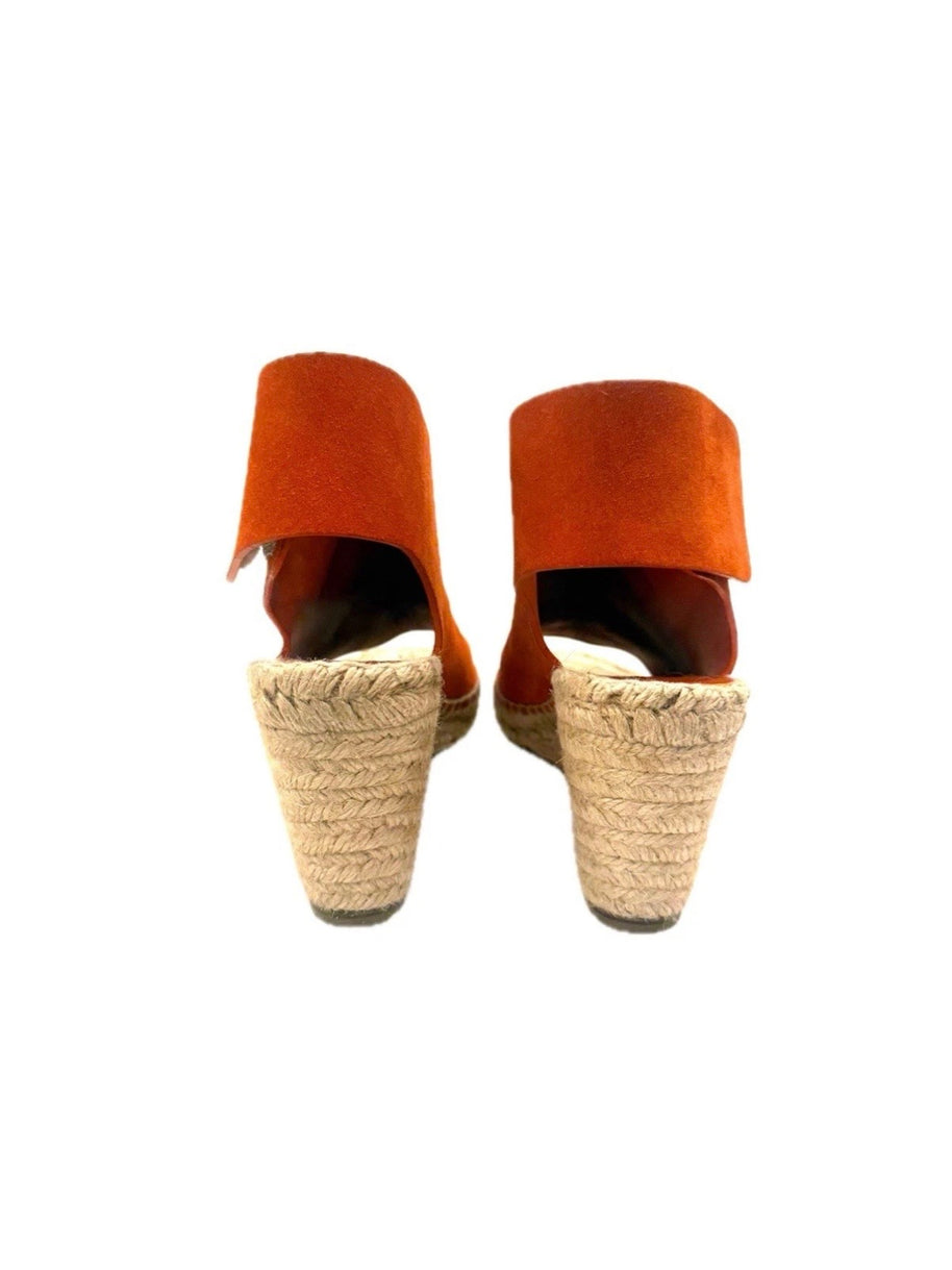 Rear view showing the jute-wrapped wedge heels and clean lines of the suede slingback strap.