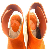 Overhead close-up of the sandal opening showing the interior leather footbed and Velcro strap construction.