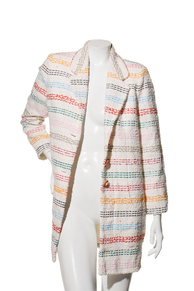Chanel Spring 2019 Runway Multicolored striped coat on a mannequin against a white background front view