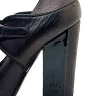 Side profile of Chanel block heel Mary Jane pump showing heel structure and smooth leather finish.