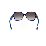 Back view of Chanel blue oversized sunglasses with curved arms and gradient lenses.