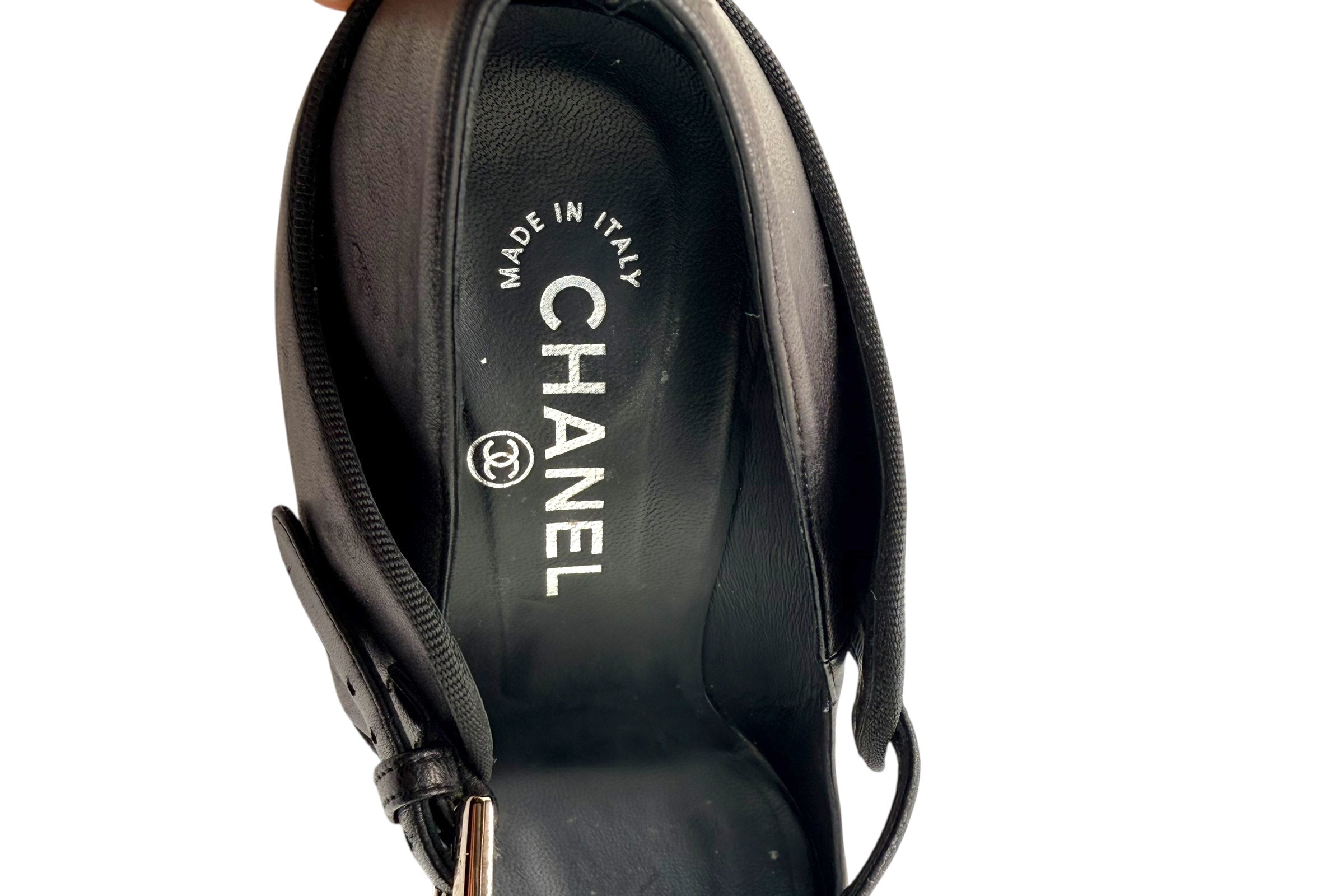 Chanel branded leather insole showing Made in Italy marking inside Mary Jane heels.