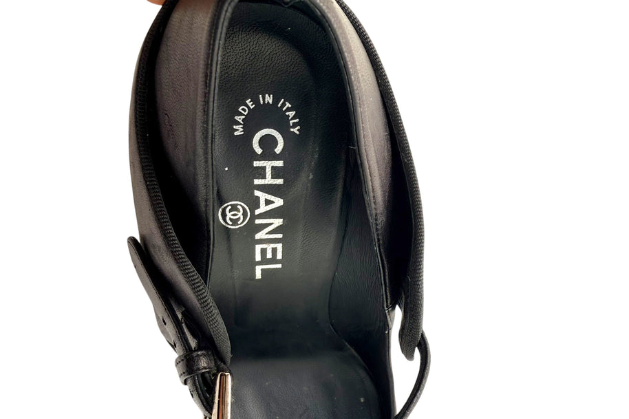 Chanel branded leather insole showing Made in Italy marking inside Mary Jane heels.