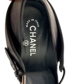 Chanel branded leather insole showing Made in Italy marking inside Mary Jane heels.