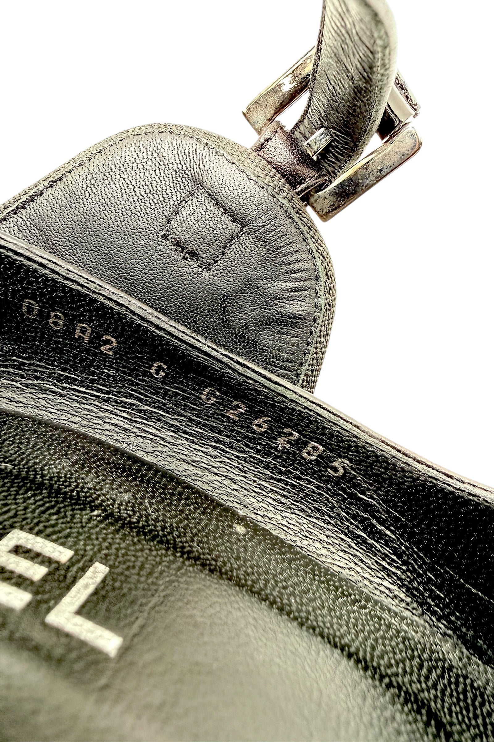 Close-up of a Chanel Mary Jane Block Heel interior with visible branding and model number.