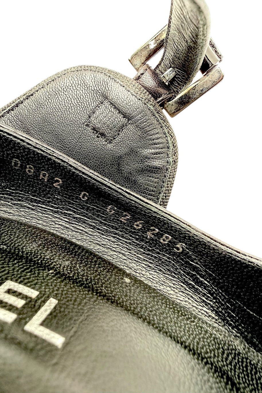 Close-up of a Chanel Mary Jane Block Heel interior with visible branding and model number.