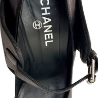 Interior view of Chanel Mary Jane pumps showing leather lining and Chanel logo insole.