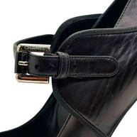 Side detail of Chanel Mary Jane strap and leather upper on block heel pump.