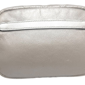 Rear strap detail of Chanel SS17 metallic silver bum bag featuring adjustable leather belt strap and polished silver tone hardware.