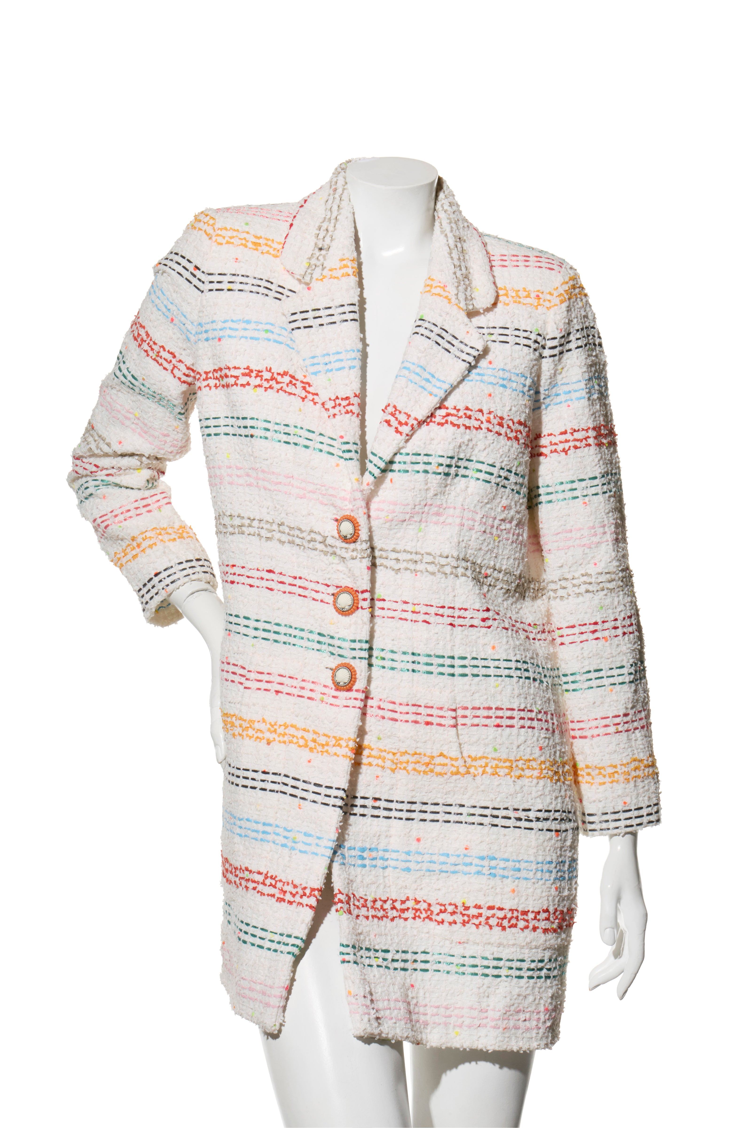 Chanel 2019 Spring Collection Multicolored striped coat buttoned on a mannequin against a white background front view.