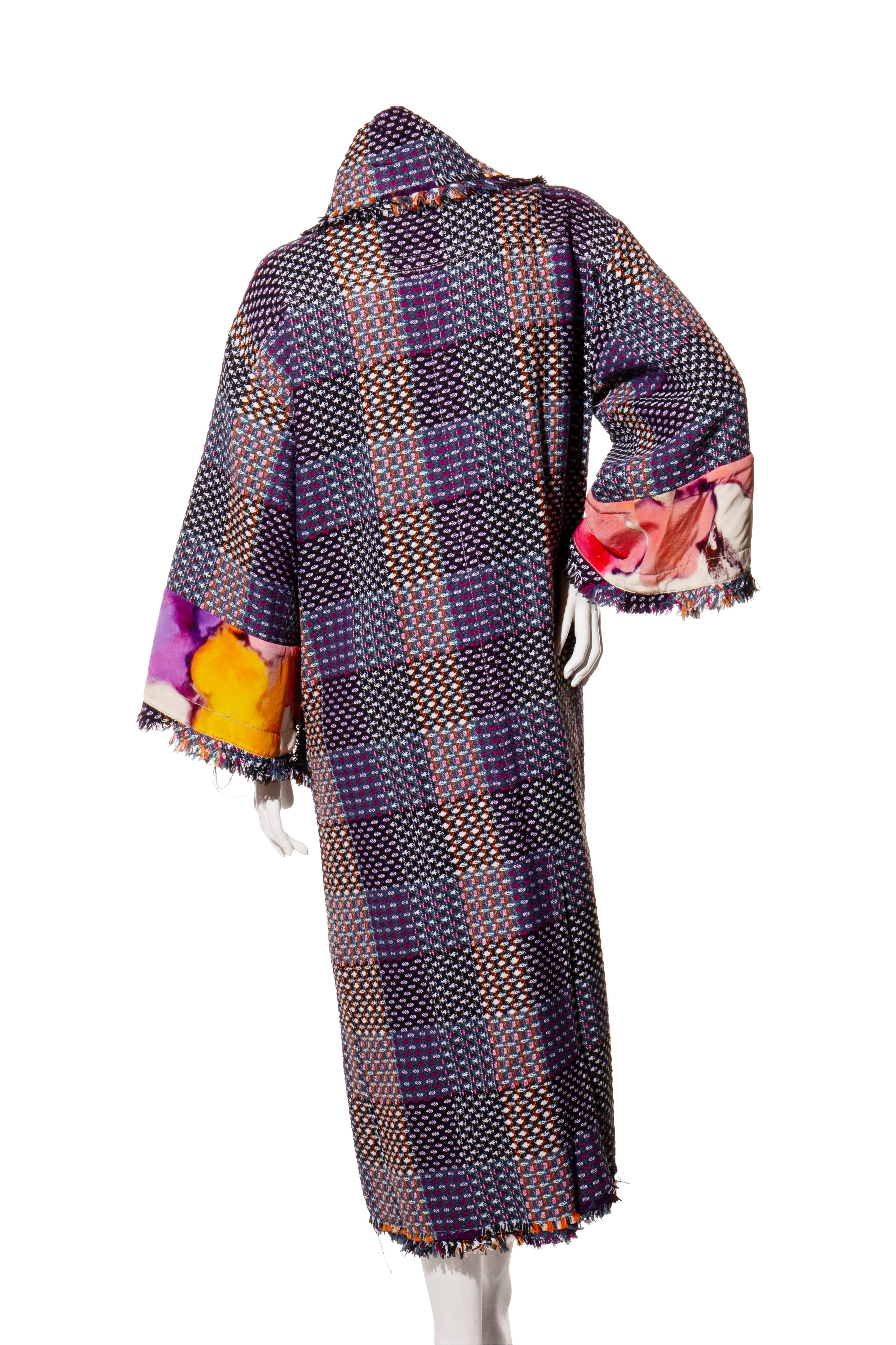 Chanel Multicolored tweed textured coat with floral pattern on a white background