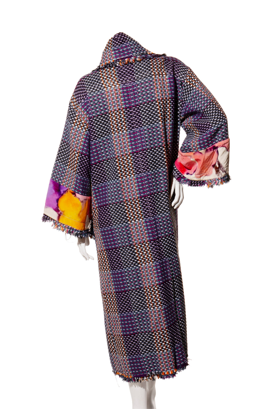 Chanel Multicolored tweed textured coat with floral pattern on a white background