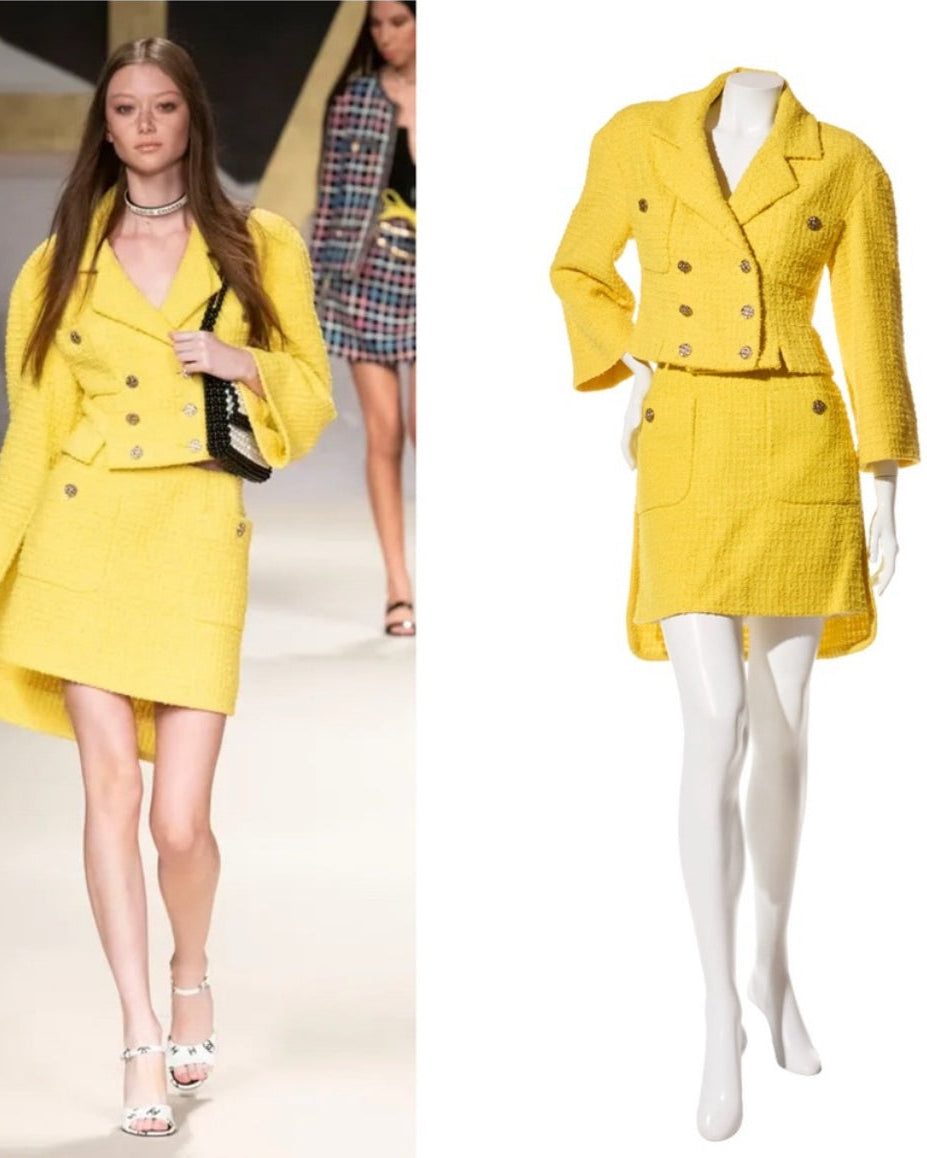 Chanel Yellow suit on a model and mannequin with people in the background