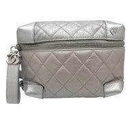 Straight on view of Chanel SS17 metallic silver quilted belt bag showing structured camera style silhouette and signature quilted leather craftsmanship.