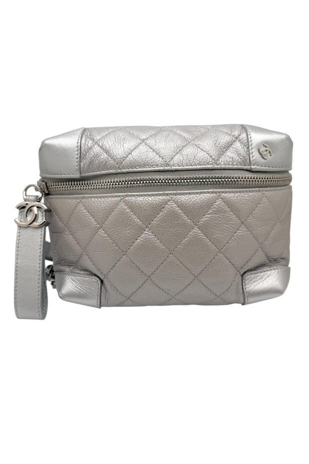 Straight on view of Chanel SS17 metallic silver quilted belt bag showing structured camera style silhouette and signature quilted leather craftsmanship.