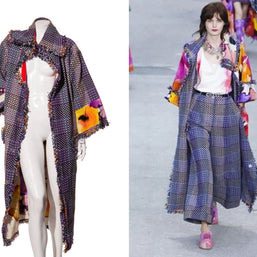 Mannequin wearing a colorful Chanel coat with a model on the runway wearing the coat for the Spring Summer 2015 Chanel Fashion Show.