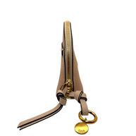 Side view of Chloé Alphabet pouch in blush calfskin featuring gold ring logo charm and leather wrist strap detail.