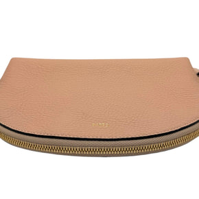 Top view of Chloé Alphabet pouch laying flat detailing zipper and leather.