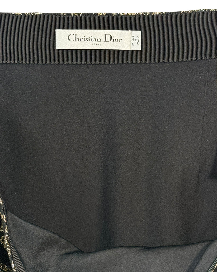 Interior view of Christian Dior Paris label inside black and gold metallic jacquard midi skirt, made in Italy.