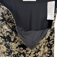 Interior view of Christian Dior metallic floral jacquard skirt showing black silk lining and craftsmanship details.