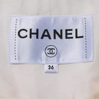 Chanel label tag and size on the Chanel multicolored striped tweed coat Spring 2019