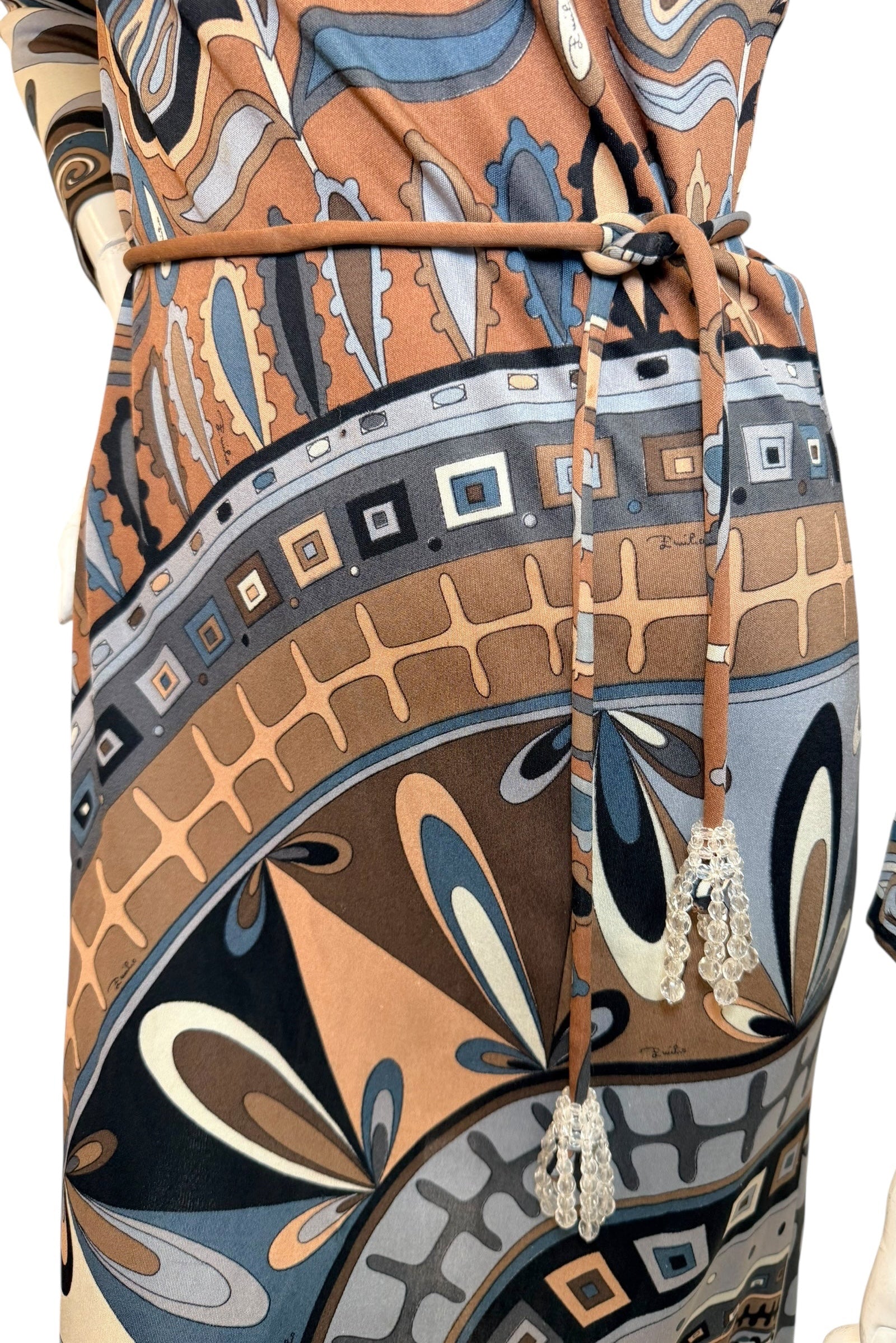 Detail of original matching waist tie belt on vintage Emilio Pucci dress with signature abstract print