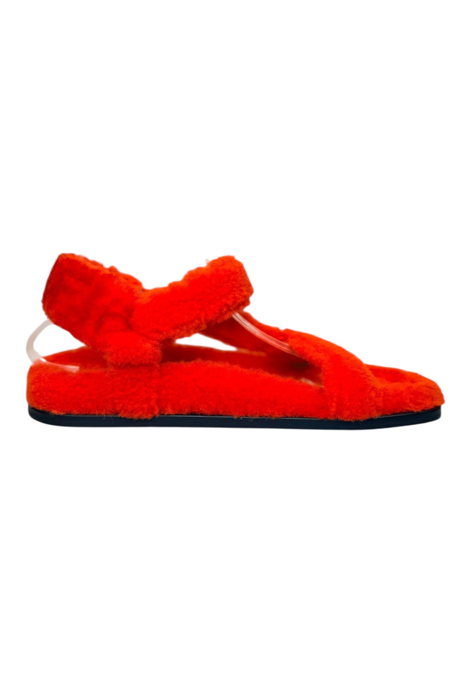 Alternate side profile of Fendi red shearling flat sandals made in Italy, plush textured design