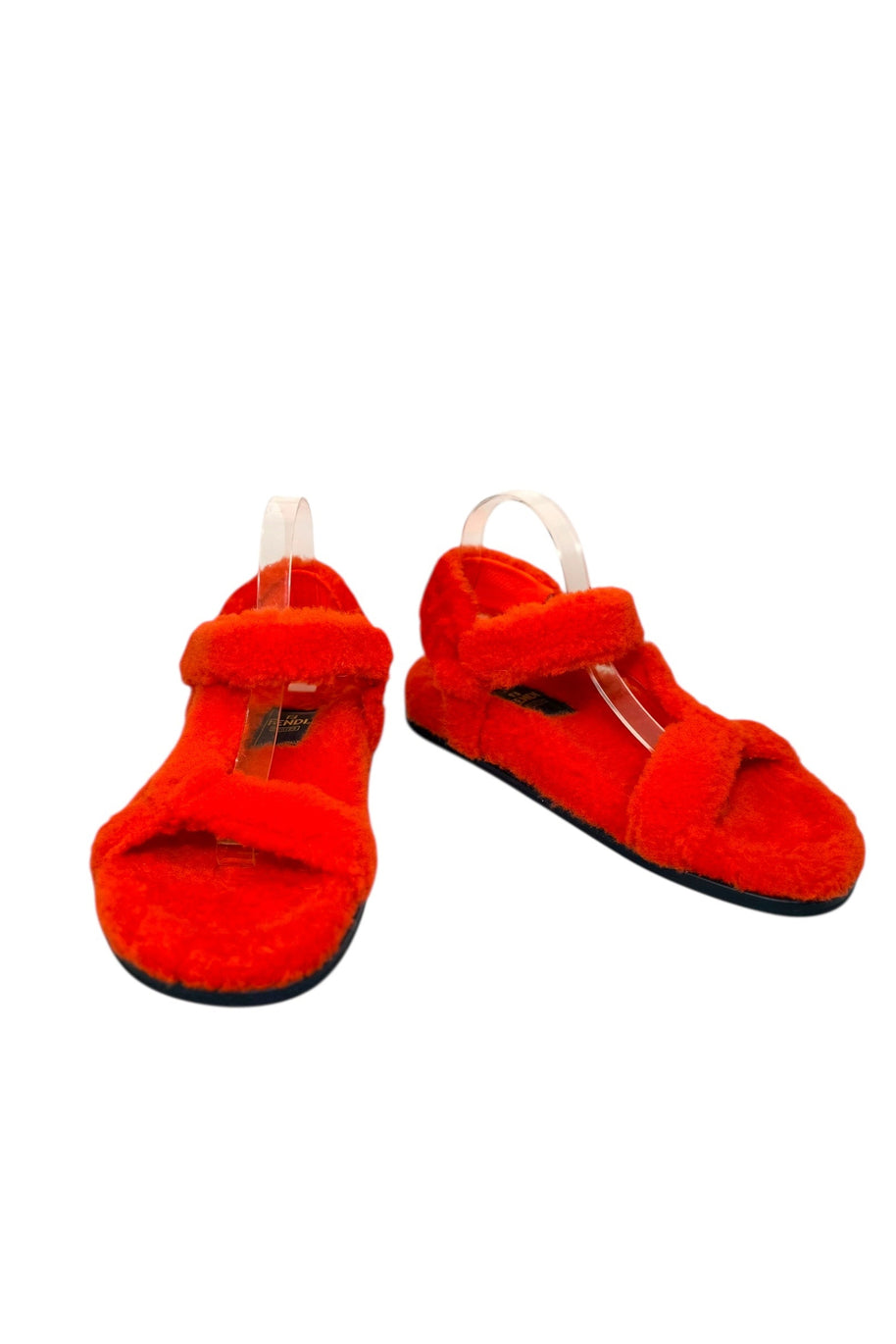 Front angled view of Fendi red shearling flat sandals with crossover straps, made in Italy, size IT 40