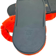 Close-up of Fendi red shearling sandal sole showing size IT 40 stamp and made in Italy detail