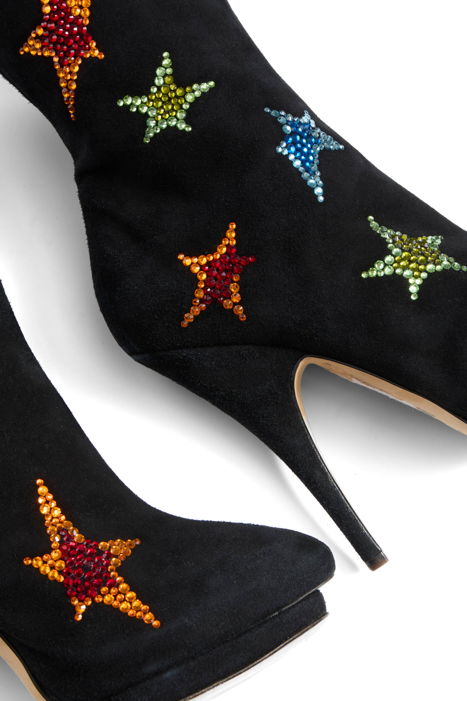 Giuseppe Zanotti Black high-heeled suede shoes close up of colorful star embellishments on a white background