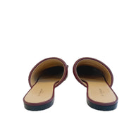 Pair of Givenchy burgundy sandals with a white background