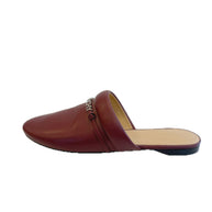 Givenchy burgundy leather slipper on a white background