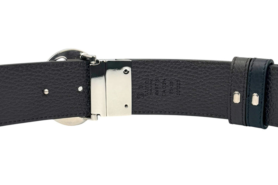 Back view of Gucci leather belt showing made in Italy stamp, style code 449715 CAO2N, and authentic branding details.