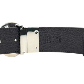 Back view of Gucci leather belt showing made in Italy stamp, style code 449715 CAO2N, and authentic branding details.