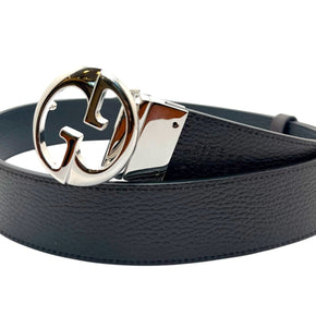 Angled hero view of Gucci black leather Interlocking G belt, luxury GG buckle accessory made in Italy.