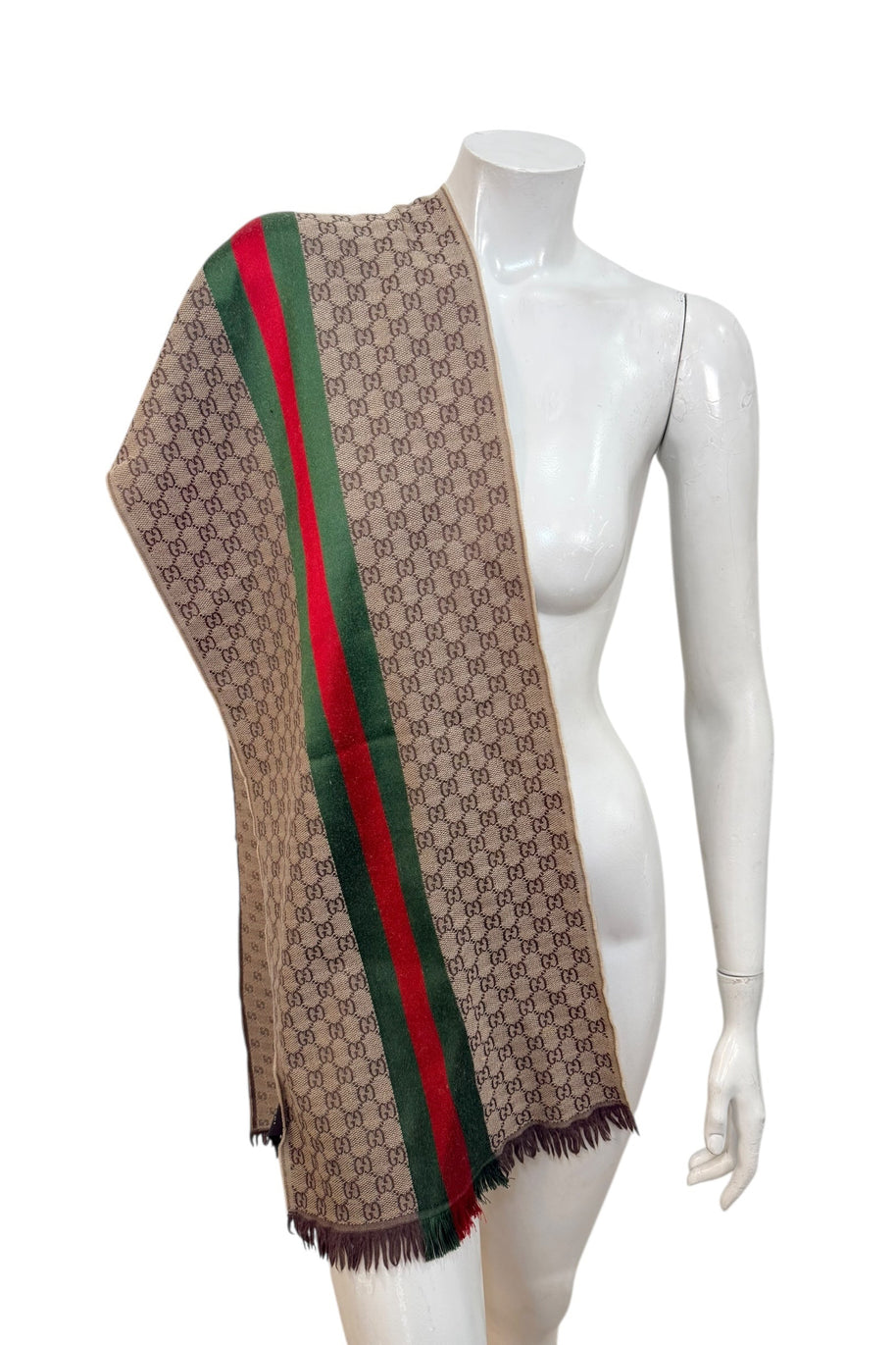 Gucci GG monogram wool silk scarf displayed vertically with iconic green red web stripe